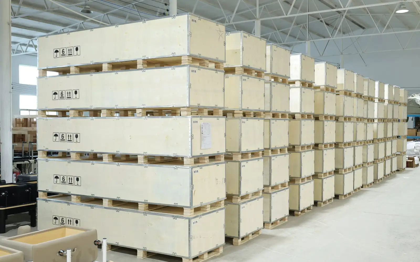Export crates ready for shipment at the TMAX factory